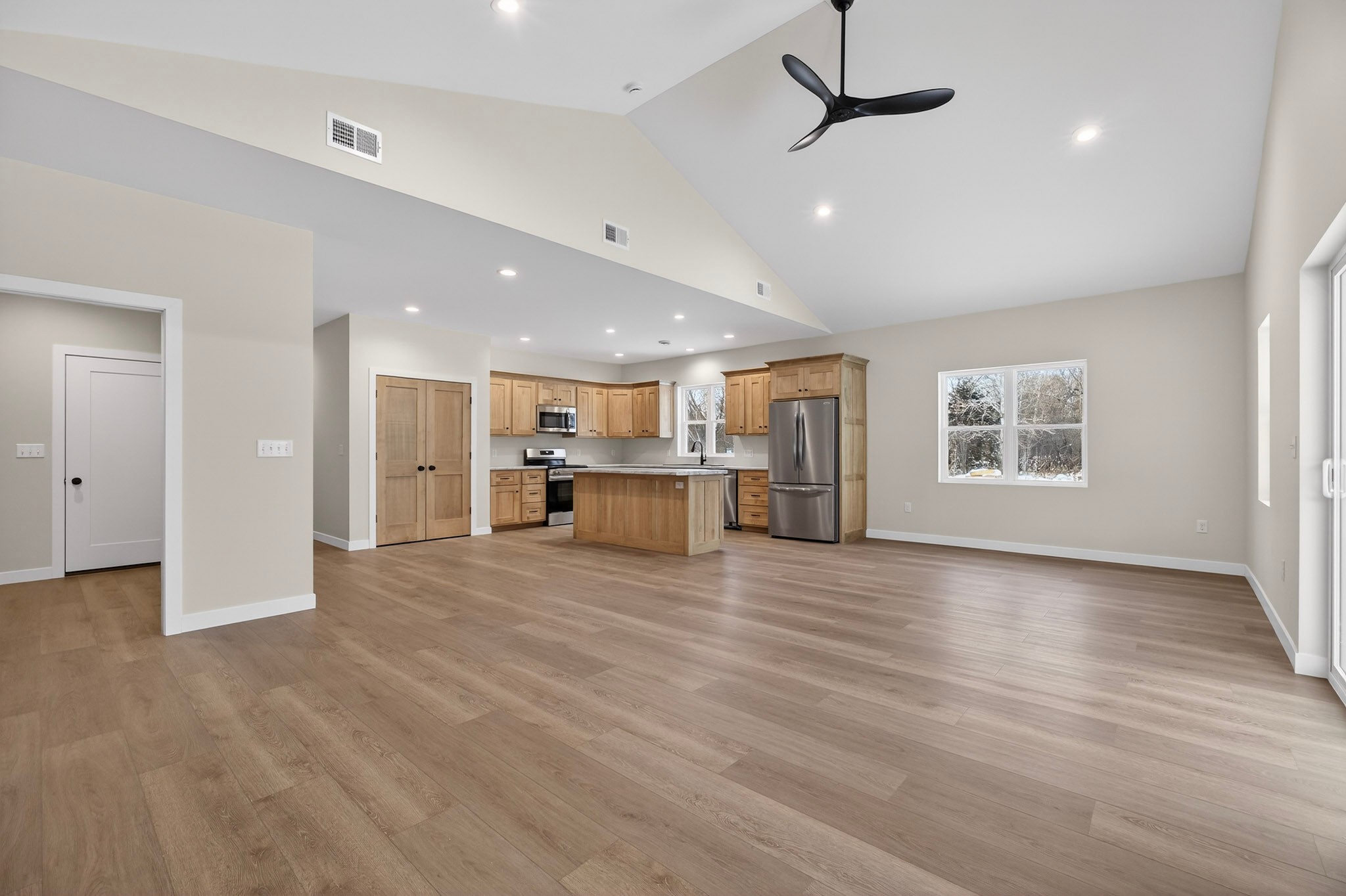 Open concept living space looking into kitchen